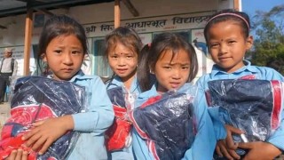 विद्यार्थीहरुलाई शैक्षिक सामाग्री तथा पोशाक बितरण