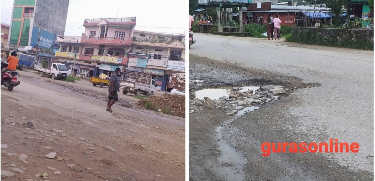 सडकमा खाडल छ,सवारी बिस्तारै हाक्नुहोस..